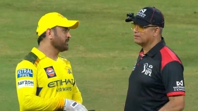 MS Dhoni with umpire after Suryakumar Yadav hit match-winning six against CSK MS Dhoni with umpire after Suryakumar Yadav hit match-winning six against CSK