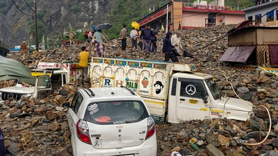 Ramban: Vehicles stuck in the debris after heavy rain triggered flash floods, in Ramban district of J&K, Sunday, April 20, 2025. (PTI) Ramban: Vehicles stuck in the debris after heavy rain triggered flash floods, in Ramban district of J&K, Sunday, April 20, 2025. (PTI)