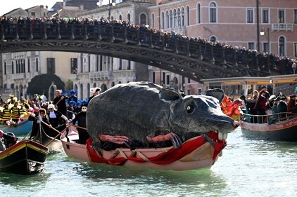 Decorated boats sail on the Grand Canal during Venice Carnival, on February 16, 2025. This year, the theme of one of the most famous carnival in the world is Casanova, as the 'Serenissima' celebrates the 300th anniversary of the famous man's birth. (Photo by ANDREA PATTARO / AFP) (AFP) Decorated boats sail on the Grand Canal during Venice Carnival, on February 16, 2025. This year, the theme of one of the most famous carnival in the world is Casanova, as the 'Serenissima' celebrates the 300th anniversary of the famous man's birth. (Photo by ANDREA PATTARO / AFP) (AFP)