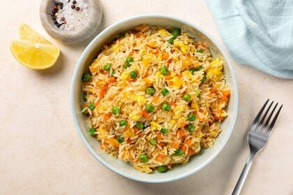 Carbs like rice bowls with ample veggies help to keep your energy up during your tattoo session. (Shutterstock) Carbs like rice bowls with ample veggies help to keep your energy up during your tattoo session. (Shutterstock)