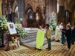 A photo of the late Pope Francis (L) is displayed during mass at St Patrick's Cathedral in Melbourne on April 22, 2025. Pope Francis died of a stroke, the Vatican announced hours after the death on April 21 of the 88-year-old reformer who inspired devotion but riled traditionalists during 12 years leading the Catholic Church. A photo of the late Pope Francis (L) is displayed during mass at St Patrick's Cathedral in Melbourne on April 22, 2025. Pope Francis died of a stroke, the Vatican announced hours after the death on April 21 of the 88-year-old reformer who inspired devotion but riled traditionalists during 12 years leading the Catholic Church.