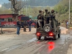 Security personnel move towards the site after terrorists attacked a group of tourists at Pahalgam.