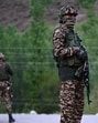 Paramilitary soldiers stands guard near Pahalgam, south of Srinagar, on Tuesday (HT Photo)