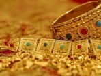 Even as global macroeconomic uncertainties continued to fuel the safe-haven chase, gold prices in the national capital jumped by  <span class='webrupee'>₹</span>1,800 on Tuesday, surpassing the critical  <span class='webrupee'>₹</span>1 lakh-mark for 10 grammes due to a rush of purchases by local jewellers and stockists anticipating increased demand during Akshaya Tritiya and wedding season.