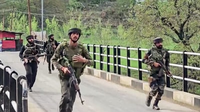 Security personnel rush to the spot following a terrorist attack on tourists, in Pahalgam on Tuesday. (ANI) Security personnel rush to the spot following a terrorist attack on tourists, in Pahalgam on Tuesday. (ANI)