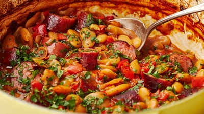 Tavče gravče, a Macedonian classic, features butter beans, smoked sausages, and sautéed vegetables for a rich, flavourful dish. (AP) Tavče gravče, a Macedonian classic, features butter beans, smoked sausages, and sautéed vegetables for a rich, flavourful dish. (AP)