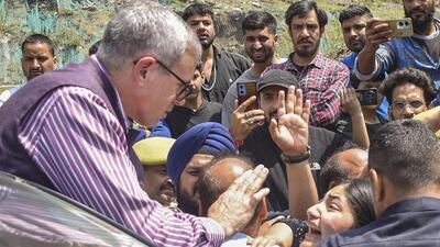Jammu and Kashmir chief minister Omar Abdullah interacting with people affected by the flood and landslides in Ramban district on Tuesday. (PTI Photo) Jammu and Kashmir chief minister Omar Abdullah interacting with people affected by the flood and landslides in Ramban district on Tuesday. (PTI Photo)