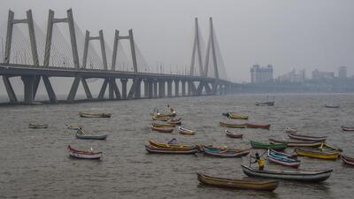 Mumbai, India - May 15, 2021: Fishermen row their boats to safety by parking them at the shore at Worli Koliwada, as Cyclone Tauktae intensifies and is likely to impact the Western coasts of Maharashtra, in Mumbai, India, on Saturday, May 15, 2021. (Photo by Pratik Chorge/Hindustan Times) (Pratik Chorge/HT PHOTO) Mumbai, India - May 15, 2021: Fishermen row their boats to safety by parking them at the shore at Worli Koliwada, as Cyclone Tauktae intensifies and is likely to impact the Western coasts of Maharashtra, in Mumbai, India, on Saturday, May 15, 2021. (Photo by Pratik Chorge/Hindustan Times) (Pratik Chorge/HT PHOTO)