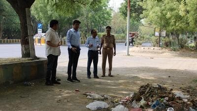 On Monday, during a surprise check, untreated sewage from Lotus Panache in Sector 110 was found overflowing onto the service road (HT Photos) On Monday, during a surprise check, untreated sewage from Lotus Panache in Sector 110 was found overflowing onto the service road (HT Photos)