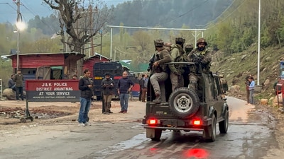 Security personnel move towards the site after terrorists attacked a group of tourists at Pahalgam. (PTI) Security personnel move towards the site after terrorists attacked a group of tourists at Pahalgam. (PTI)