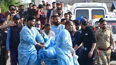 Paramedics carry an injured tourist at a hospital in Anantnag south of Srinagaron 22 April (Hindustan Times/Waseem Andrabi) Paramedics carry an injured tourist at a hospital in Anantnag south of Srinagaron 22 April (Hindustan Times/Waseem Andrabi)
