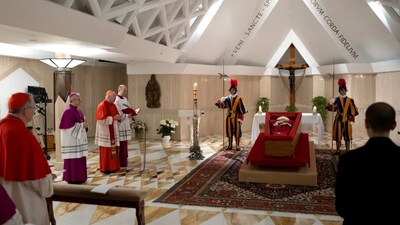 On Tuesday, the Vatican released a picture and a video of Pope Francis in his open casket, wearing a red robe, holding a rosary, and wearing the papal mitre on his head. (AFP) On Tuesday, the Vatican released a picture and a video of Pope Francis in his open casket, wearing a red robe, holding a rosary, and wearing the papal mitre on his head. (AFP)