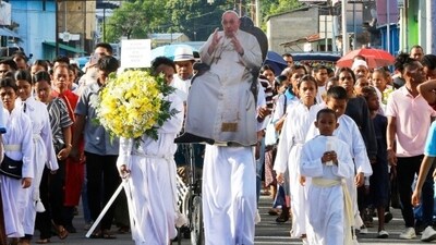 Devotees carry a cutout of the late Pope Francis during a procession ahead of a prayer in Dili, East Timor, Tuesday, April 22, 2025. (AP Photo/Lorenio L.Pereira) Devotees carry a cutout of the late Pope Francis during a procession ahead of a prayer in Dili, East Timor, Tuesday, April 22, 2025. (AP Photo/Lorenio L.Pereira)
