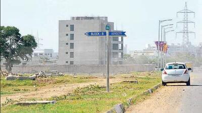 The land put under auction was earlier meant for the economically weaker section but converted into residential group housing sites after the Punjab government approved a policy in February to e-auction such land across the state. (HT Photo) The land put under auction was earlier meant for the economically weaker section but converted into residential group housing sites after the Punjab government approved a policy in February to e-auction such land across the state. (HT Photo)