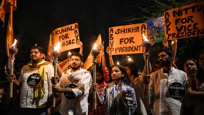 Akhil Bharatiya Vidyarthi Parishad (ABVP) supporters take part in a Mashaal Juloos, at JNU Campus in New Delhi on Monday. (ANI) Akhil Bharatiya Vidyarthi Parishad (ABVP) supporters take part in a Mashaal Juloos, at JNU Campus in New Delhi on Monday. (ANI)