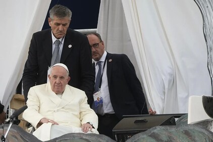 Massimiliano Strappetti, right, followed Pope Francis as he met young people and elders at Nakasuk Elementary School Square in Iqaluit, Canada, Friday, July 29, 2022. Francis had promoted the Vatican nurse whom he credited with saving his life to be his “personal health care assistant.” (AP) Massimiliano Strappetti, right, followed Pope Francis as he met young people and elders at Nakasuk Elementary School Square in Iqaluit, Canada, Friday, July 29, 2022. Francis had promoted the Vatican nurse whom he credited with saving his life to be his “personal health care assistant.” (AP)