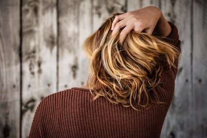 Coloured hair care: Colour treated hair needs extra care. Make sure you use colour-protecting shampoo. Also, use a nourishing mask every twice a week to retain the moisture. (Unsplash)