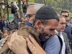 Jammu and Kashmir chief minister Omar Abdullah consoling the father of Syed Adil Hussain Shah, a pony ride operator who was killed in the terrorist attack in Pahalgam on Tuesday, in Anantnag district on Wednesday.