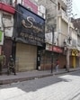 Paramilitary forces stand guard near closed shops in a deserted marketplace on Wednesday following the Pahalgam terror attack. (AP Photo)