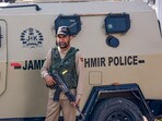A security personnel stands guard in a closed market during a strike call given by traders, transporters and other several organisations against the Pahalgam terror attacks in which 26 tourists were killed.