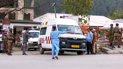 Injured tourists being bought to a hospital after terrorists target tourists in J&K's Pahalgam, on Tuesday. (ANI Grab) Injured tourists being bought to a hospital after terrorists target tourists in J&K's Pahalgam, on Tuesday. (ANI Grab)