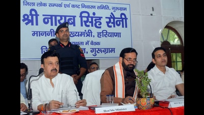 Haryana chief minister Nayab Singh Saini and cabinet minister Rao Narbir Singh at a meeting in Gurugram on Wednesday. (HT PHOTO) Haryana chief minister Nayab Singh Saini and cabinet minister Rao Narbir Singh at a meeting in Gurugram on Wednesday. (HT PHOTO)