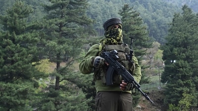 A paramilitary serviceman keeps watch in Pahalgam, south of Srinagar on April 23, 2025, following an attack. At least 26 people were killed April 22 in Kashmir when gunmen opened fire on tourists. (AFP)