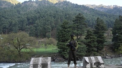 A paramilitary serviceman keeps watch in Pahalgam, south of Srinagar on April 23, 2025, following an attack. At least 26 people were killed April 22 in Kashmir when gunmen opened fire on tourists. (AFP)