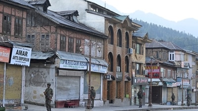 Paramilitary personnel conduct a patrol in Pahalgam, south of Srinagar on April 23, 2025, following an attack. (AFP)