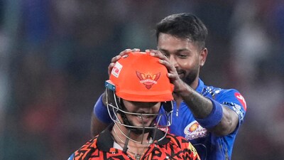 Hardik Pandya, right, gestures as Ishan Kishan walks off the field after losing his wicket during the IPL match between Sunrisers Hyderabad and Mumbai Indians (AP) Hardik Pandya, right, gestures as Ishan Kishan walks off the field after losing his wicket during the IPL match between Sunrisers Hyderabad and Mumbai Indians (AP)