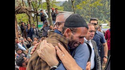 J&K Chief Minister Omar Abdullah consoles the father of Adil Hussain Shah, a pony ride operator who was killed in a terrorist attack in Pahalgam on Tuesday, in Anantnag district on Wednesday. (PTI) J&K Chief Minister Omar Abdullah consoles the father of Adil Hussain Shah, a pony ride operator who was killed in a terrorist attack in Pahalgam on Tuesday, in Anantnag district on Wednesday. (PTI)