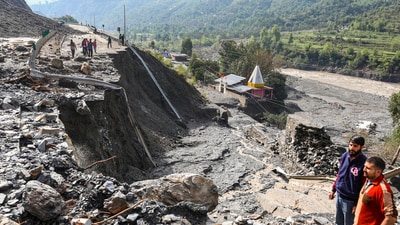 A damaged portion of Jammu-Srinagar National Highway after landslides and flash flood following heavy rainfall, in Ramban district, Jammu and Kashmir. (PTI Photo) A damaged portion of Jammu-Srinagar National Highway after landslides and flash flood following heavy rainfall, in Ramban district, Jammu and Kashmir. (PTI Photo)