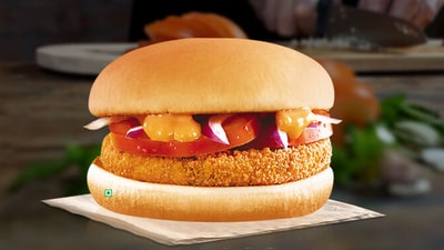 The burger with an Indian connection is being served at an outlet dubbed McDonald’s Global Menu Restaurant. (mcdonaldsblog.in) The burger with an Indian connection is being served at an outlet dubbed McDonald’s Global Menu Restaurant. (mcdonaldsblog.in)