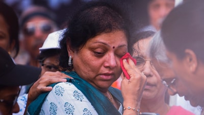 Archana Deodhar, terror attack victim Kaustubh Ganbote's sister, during a demonstration against the incident in Pune on Wednesday. (PTI) Archana Deodhar, terror attack victim Kaustubh Ganbote's sister, during a demonstration against the incident in Pune on Wednesday. (PTI)