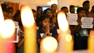 Students pay homage at a school in Chennai to the deceased who were killed by terrorists n in Kashmir's Pahalgam. (AFP) Students pay homage at a school in Chennai to the deceased who were killed by terrorists n in Kashmir's Pahalgam. (AFP)