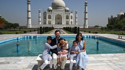 TOPSHOT - US Vice President JD Vance, his wife Usha Vance, daughter Mirabel and sons Ewan (L) and Vivek pose during their tour at the Taj Mahal in Agra on April 23, 2025. Vance said on April 22 that "good progress" had been made towards a trade deal with India after meeting with "tough negotiator" Prime Minister Narendra Modi in New Delhi. (Photo by Kenny HOLSTON / POOL / AFP) (AFP) TOPSHOT - US Vice President JD Vance, his wife Usha Vance, daughter Mirabel and sons Ewan (L) and Vivek pose during their tour at the Taj Mahal in Agra on April 23, 2025. Vance said on April 22 that "good progress" had been made towards a trade deal with India after meeting with "tough negotiator" Prime Minister Narendra Modi in New Delhi. (Photo by Kenny HOLSTON / POOL / AFP) (AFP)