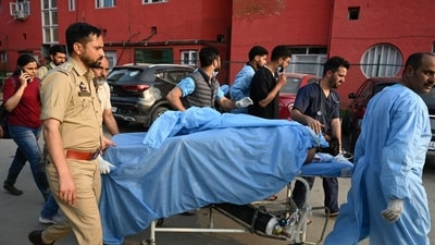 Paramedics carry an injured tourist at a hospital in Anantnag south of Srinagar, on April 22. (Waseem Andrabi /Hindustan Times) Paramedics carry an injured tourist at a hospital in Anantnag south of Srinagar, on April 22. (Waseem Andrabi /Hindustan Times)