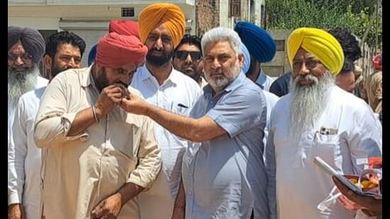 Lal Chand Kataruchak at a grain market in Sangrur on Wednesday. (HT Photo)
