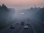 People drive on the Garden State Parkway as a matrix sign warns of smoke conditions on April 24, 2025, in New Jersey. People drive on the Garden State Parkway as a matrix sign warns of smoke conditions on April 24, 2025, in New Jersey.