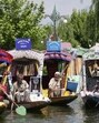 Shikara boatmen holding placards, distributed to them by a group of students, at Dal Lake in Srinagar on Thursday. They were protesting against the Pahalgam terror attack that left 26 tourists dead on Tuesday. (AFP Photo) Shikara boatmen holding placards, distributed to them by a group of students, at Dal Lake in Srinagar on Thursday. They were protesting against the Pahalgam terror attack that left 26 tourists dead on Tuesday. (AFP Photo)