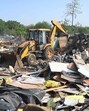 The bulldozers got rolling around 7 am and the entire illegal colony, housing around 1,800 shanties, was brought down by 12 pm. (Keshav Singh/HT) The bulldozers got rolling around 7 am and the entire illegal colony, housing around 1,800 shanties, was brought down by 12 pm. (Keshav Singh/HT)