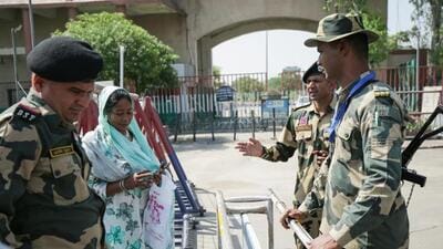 A woman requests to cross Attari border after the government of India decides to close the integrated checkpost. (ANI photo) A woman requests to cross Attari border after the government of India decides to close the integrated checkpost. (ANI photo)