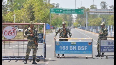 Border Security Force personnel stand guard at Attari Integrated Check Post in Amritsar on Thursday. (Sameer Sehgal/HT) Border Security Force personnel stand guard at Attari Integrated Check Post in Amritsar on Thursday. (Sameer Sehgal/HT)