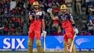 Virat Kohli and Devdutt Padikkal kept their recent streak of solid partnerships going, this time adding 95 runs for the second wicket with both bringing up half-centuries. (AFP) Virat Kohli and Devdutt Padikkal kept their recent streak of solid partnerships going, this time adding 95 runs for the second wicket with both bringing up half-centuries. (AFP)