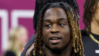 Ashton Jeanty #RB15 of Boise State looks on during the NFL Scouting Combine at Lucas Oil Stadium on March 01, 2025 in Indianapolis, Indiana. (Photo by Stacy Revere / GETTY IMAGES NORTH AMERICA / Getty Images via AFP) (Getty Images via AFP) Ashton Jeanty #RB15 of Boise State looks on during the NFL Scouting Combine at Lucas Oil Stadium on March 01, 2025 in Indianapolis, Indiana. (Photo by Stacy Revere / GETTY IMAGES NORTH AMERICA / Getty Images via AFP) (Getty Images via AFP)