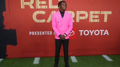 Colorado Buffaloes wide receiver Travis Hunter on the red carpet before the 2025 NFL Draft at Lambeau Field. Mandatory Credit: Kirby Lee-Imagn Images (IMAGN IMAGES via Reuters Connect)