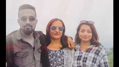 File photo of deceased Sudeep Nayopan with mother and sister. (Sourced) File photo of deceased Sudeep Nayopan with mother and sister. (Sourced)