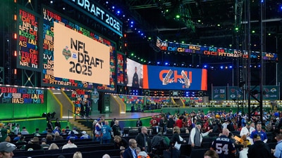 Fans arrive at the draft theater before the first round of the NFL football draft, Thursday, April 24, 2025, in Green Bay, Wis. (AP Photo/Jeff Roberson) (AP) Fans arrive at the draft theater before the first round of the NFL football draft, Thursday, April 24, 2025, in Green Bay, Wis. (AP Photo/Jeff Roberson) (AP)