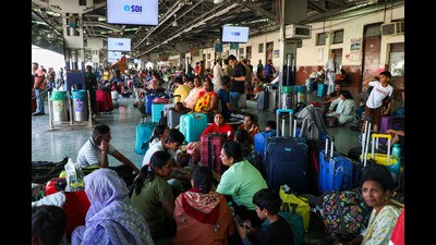 Tourists wait at Jammu railway station after returning from Kashmir on Thursday. (PTI) Tourists wait at Jammu railway station after returning from Kashmir on Thursday. (PTI)