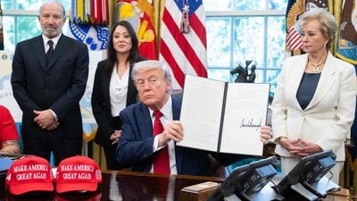 US President Donald Trump signs executive orders relating to higher education institutions, alongside US Secretary of Commerce Howard Lutnick (L) and US Secretary of Education Linda McMahon (R), in the Oval Office of the White House in Washington, DC, (AFP) US President Donald Trump signs executive orders relating to higher education institutions, alongside US Secretary of Commerce Howard Lutnick (L) and US Secretary of Education Linda McMahon (R), in the Oval Office of the White House in Washington, DC, (AFP)